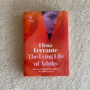 Hardcover book. “The Lying Life of Adults” by Elena Ferrante